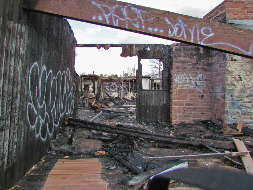 Abandoned home with graffiti on the walls in Navajo, NM. 