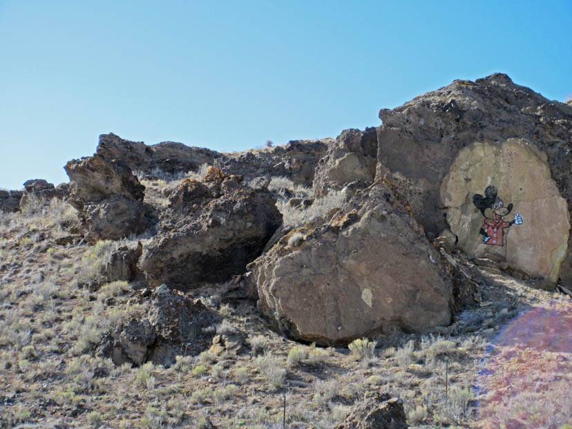 Cartoon mouse painted on a boulder in Dilkon, AZ.  