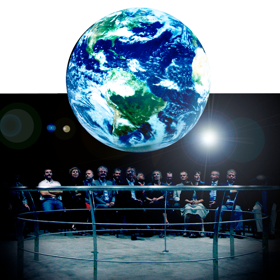 SOS globe display with people the crowd looking up at it