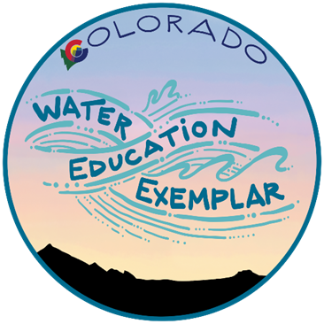 Circular logo with a pastel sunset background and mountain silhouette at the bottom. The word ‘COLORADO’ curves across the top, with the ‘C’ in the style of the Colorado state flag. Flowing turquoise lines resembling water contain the words ‘WATER EDUCATION EXEMPLAR’ in hand-drawn lettering
