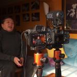 Ryan Vachon recording a women in her home