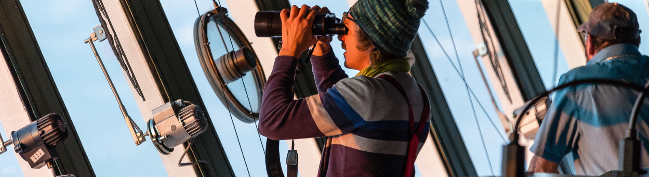 MOSAiC crew member with binoculars