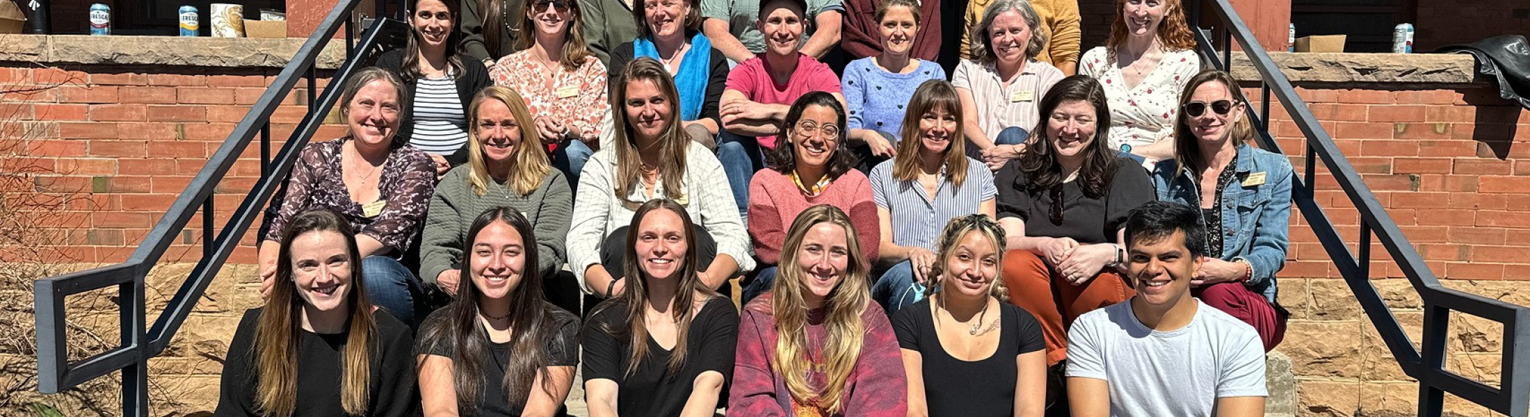 CEEE team photo on the front stairs of the building 