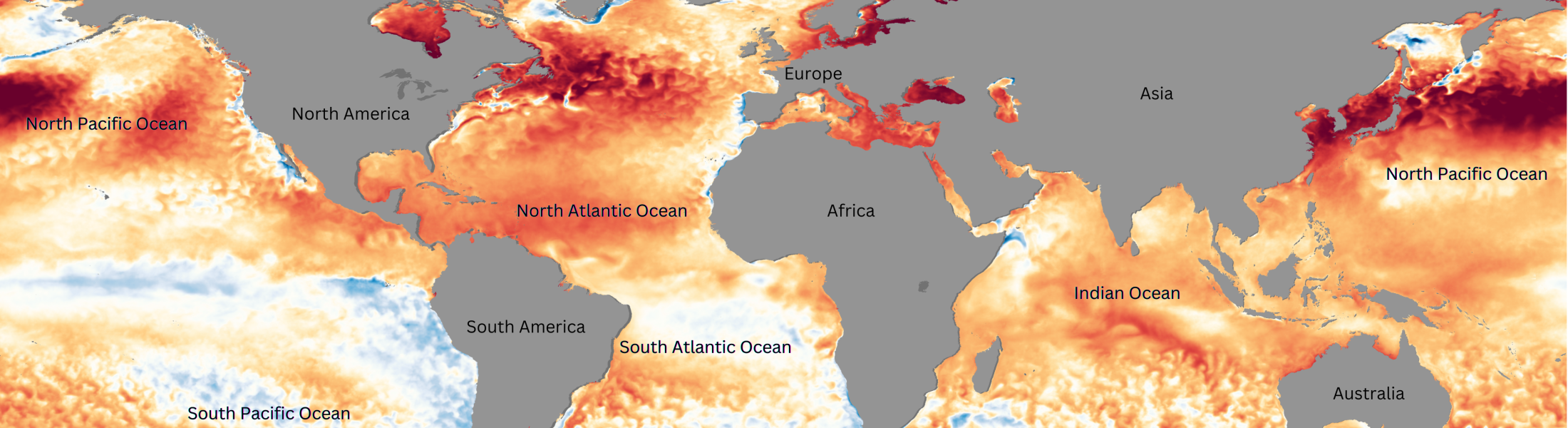 Global map showing sea surface temperature anomalies. Areas with above-average temperatures are shaded in red and dark red, while cooler-than-average regions are in blue. Major oceans and geographic regions are labeled, highlighting significant warm anomalies in the North Pacific, North Atlantic, and Indian Ocean.