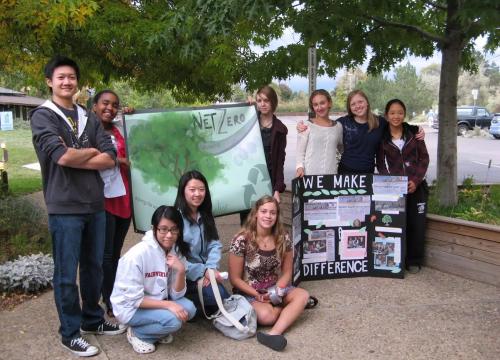 This is an image of 9 students who are sharing their environmental projects. 