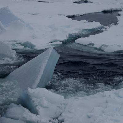 Ice berg breaking on the ocean 