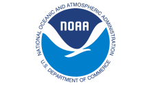 Round NOAA logo with a dark blue upper half containing the text 'NOAA' in white, and a light blue lower half featuring a white stylized seagull in flight