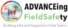 Logo for “ADVANCEing FieldSafety.” The design features an illustration inside a circular frame divided into four quadrants showing diverse people collaborating in different outdoor and fieldwork settings—urban, rural, coastal, and natural environments. To the right, the text reads “ADVANCEing FieldSafety” with “ADVANCE” and “ty” in black and “FieldSafe” in light green. Below, the tagline says “Building Safe and Supportive Field Teams. 